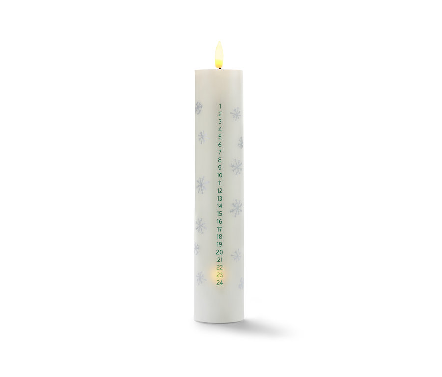 LED svíčka z pravého vosku s adventním kalendářem s čísly a vločkami.
