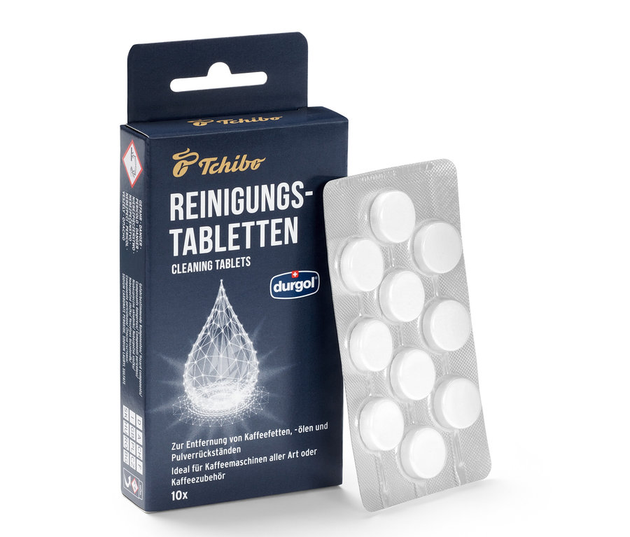 Balení čisticích tablet durgol® k odstranění kávových tuků a blistr s tabletami.