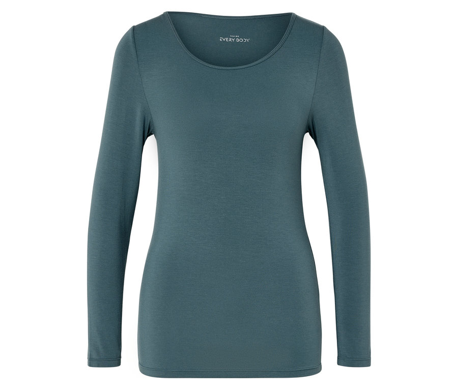 Modrozelené tričko s dlouhým rukávem leží na rovném povrchu.