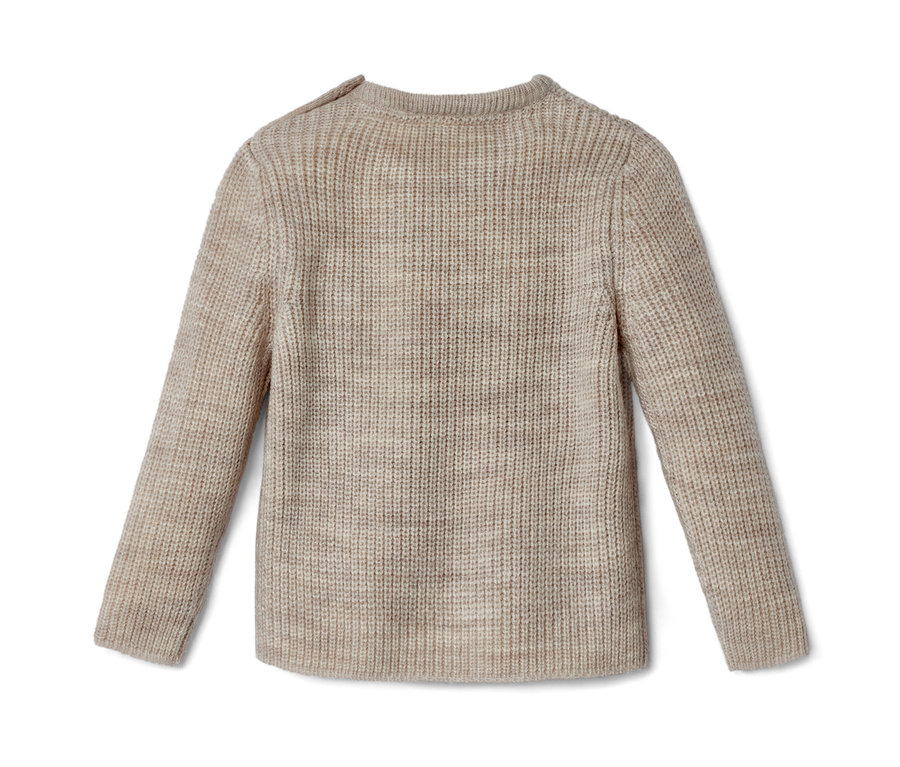 Detail dětského vlněného svetru.