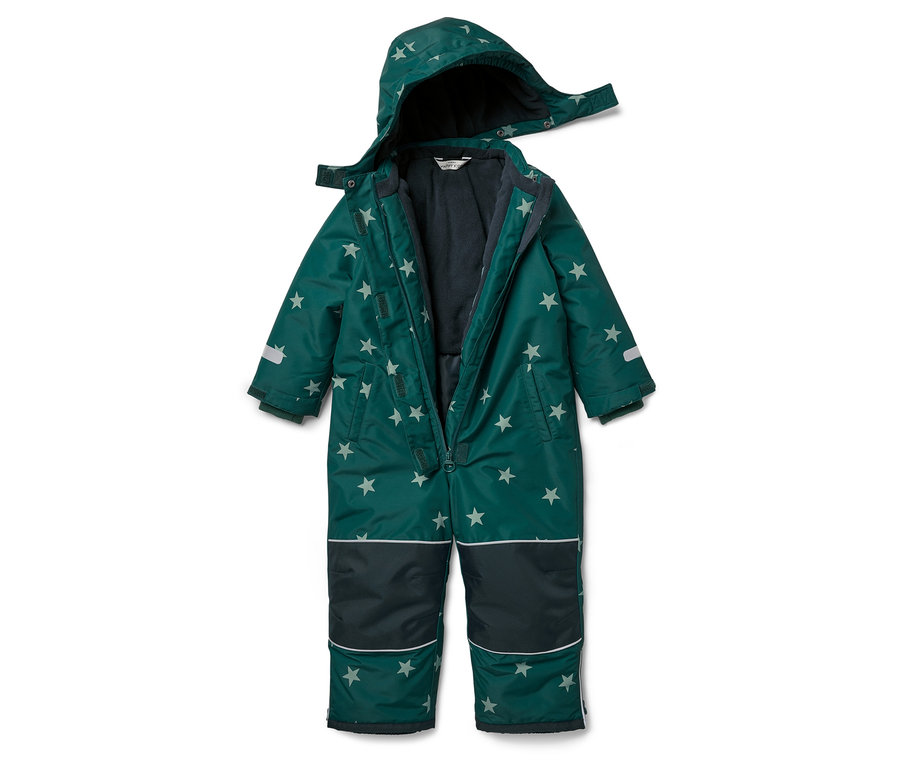 Zelená kombinéza se vzorem hvězd.
