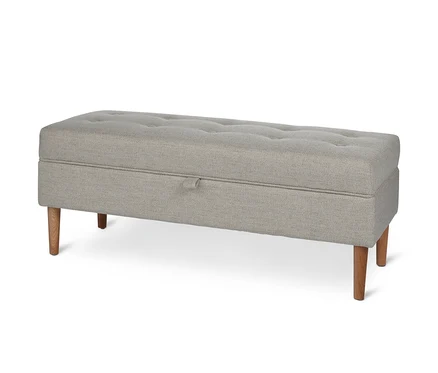Čalouněná lavice s úložným prostorem a knoflíky.