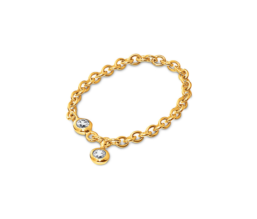 Detail zlatého prstenu se zirkony.