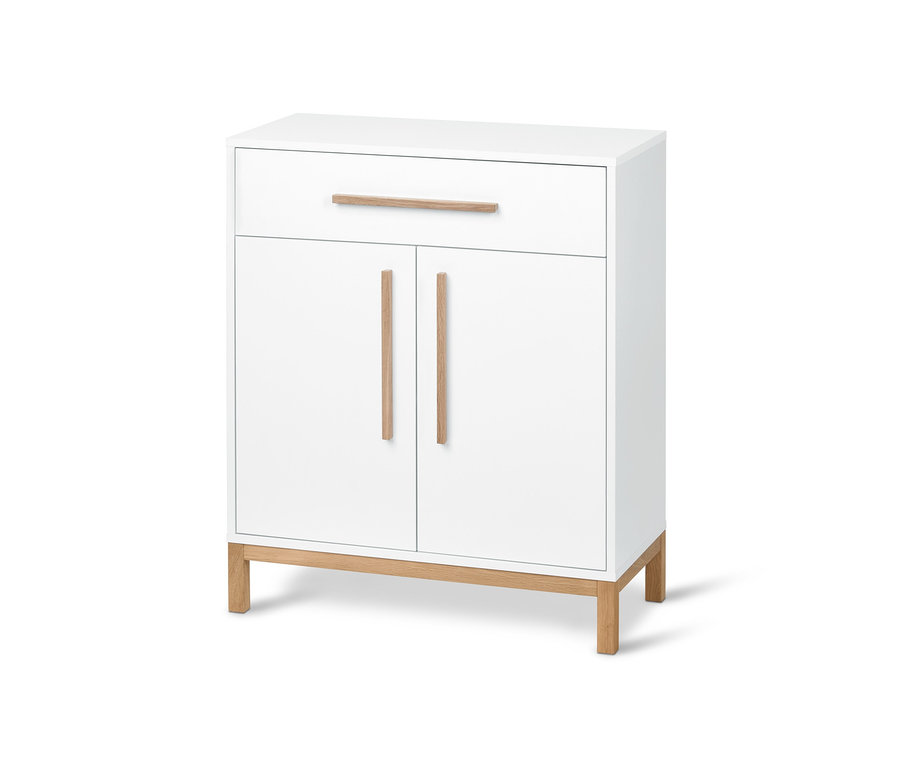 Bílá koupelnová skříňka s dvířky a zásuvkou.