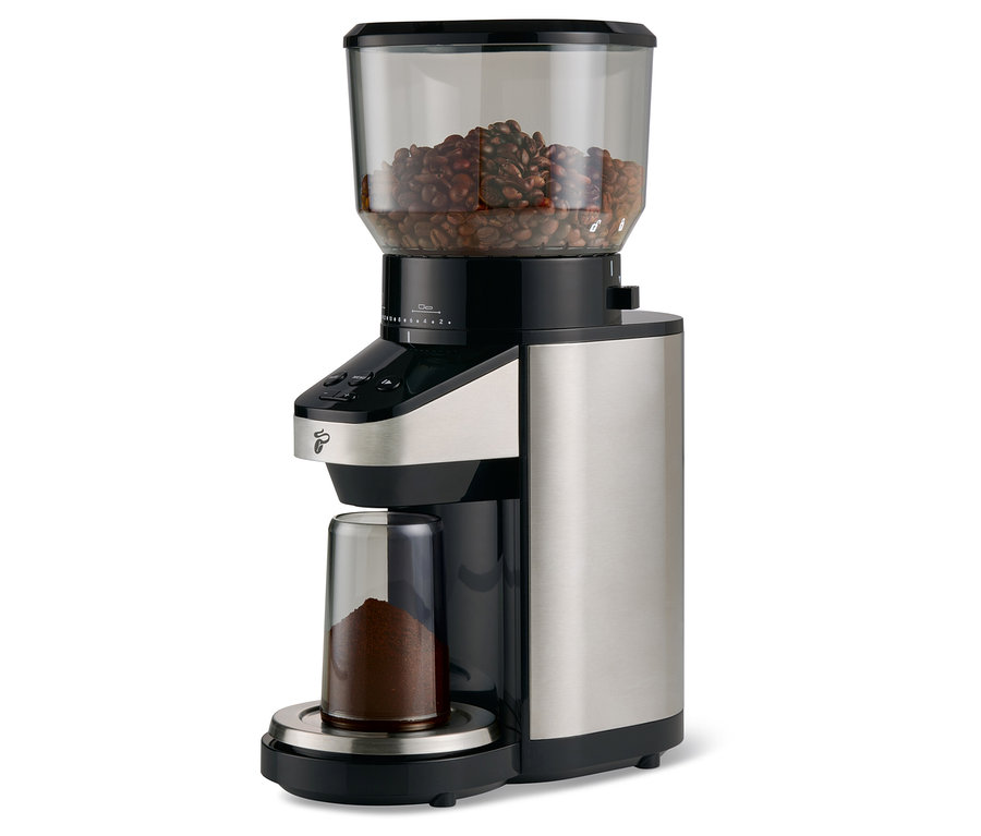 Elektrický mlýnek na kávu s váhou. V horní části je nádoba s kávovými zrny, v dolní části nádoba s umletou kávou.