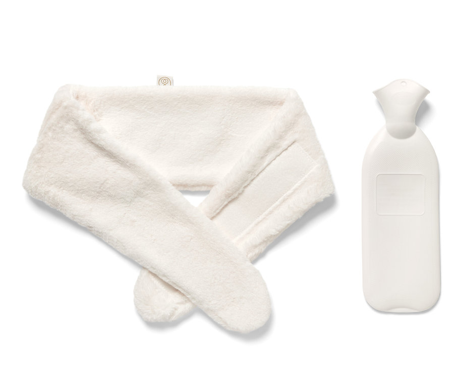 Bílý termofor a popruh.