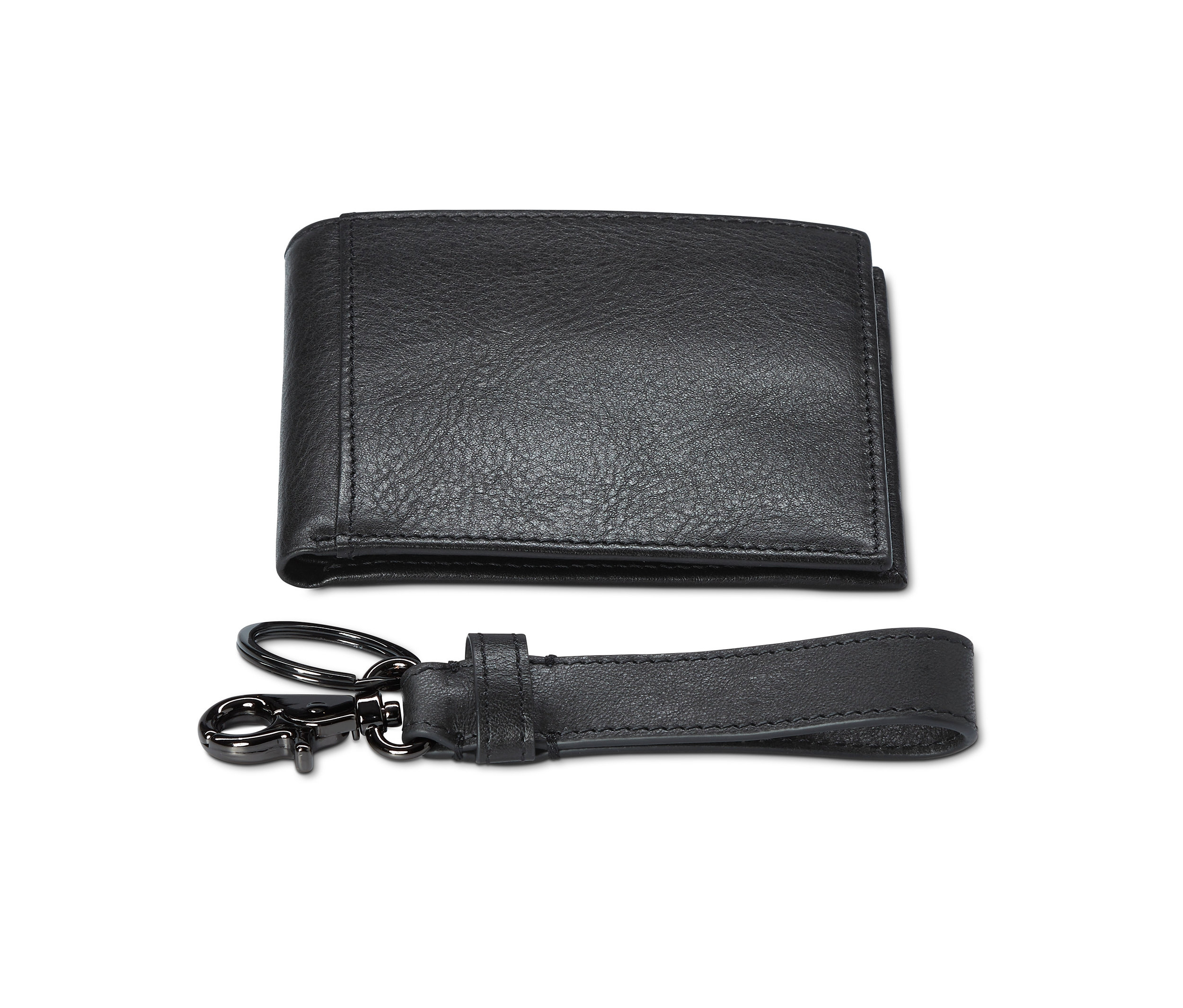Černá kožená peněženka a přívěsek na klíče z dárkové sady.