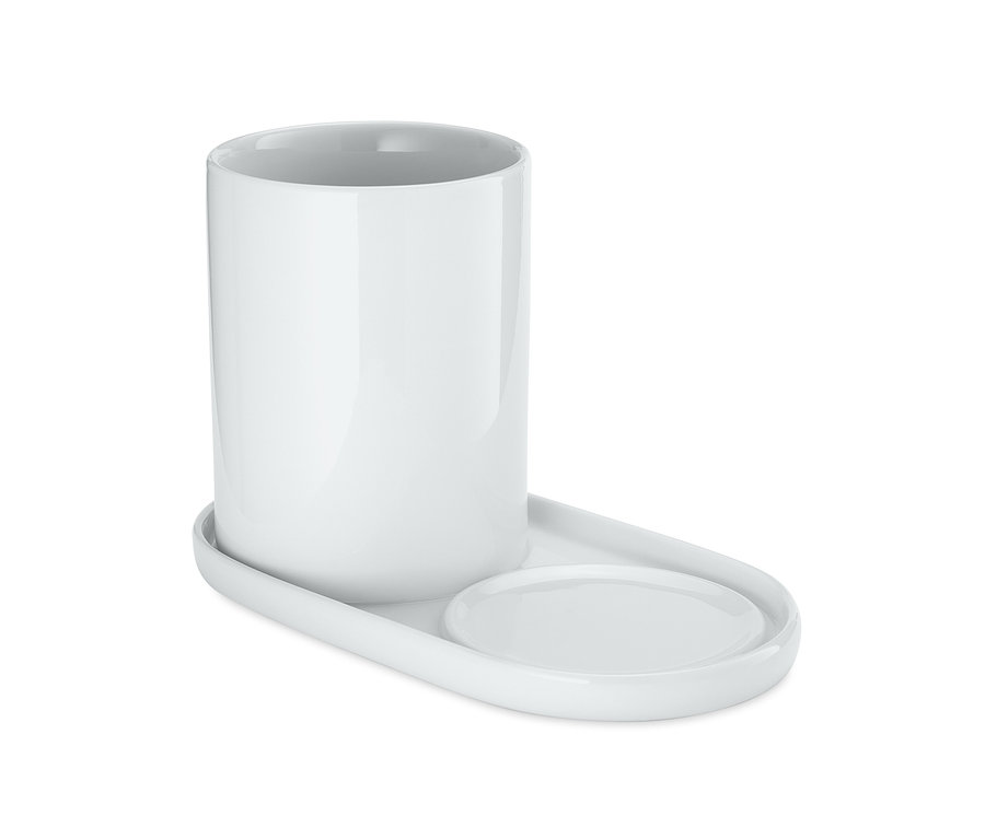 Bílý keramický organizér na potřeby na umývání nádobí.