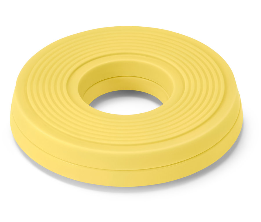 Žlutý kruh s dírou uprostřed.