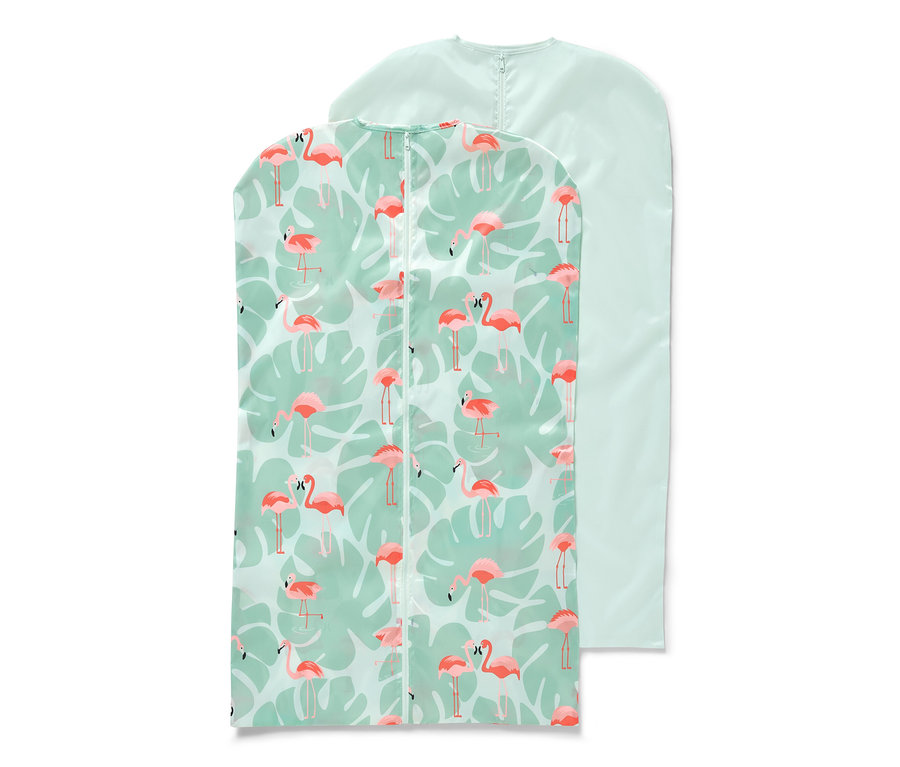 Dva ochranné obaly na oděvy. Jeden je světle zelený s potiskem plameňáků a listů, druhý světle zelený.