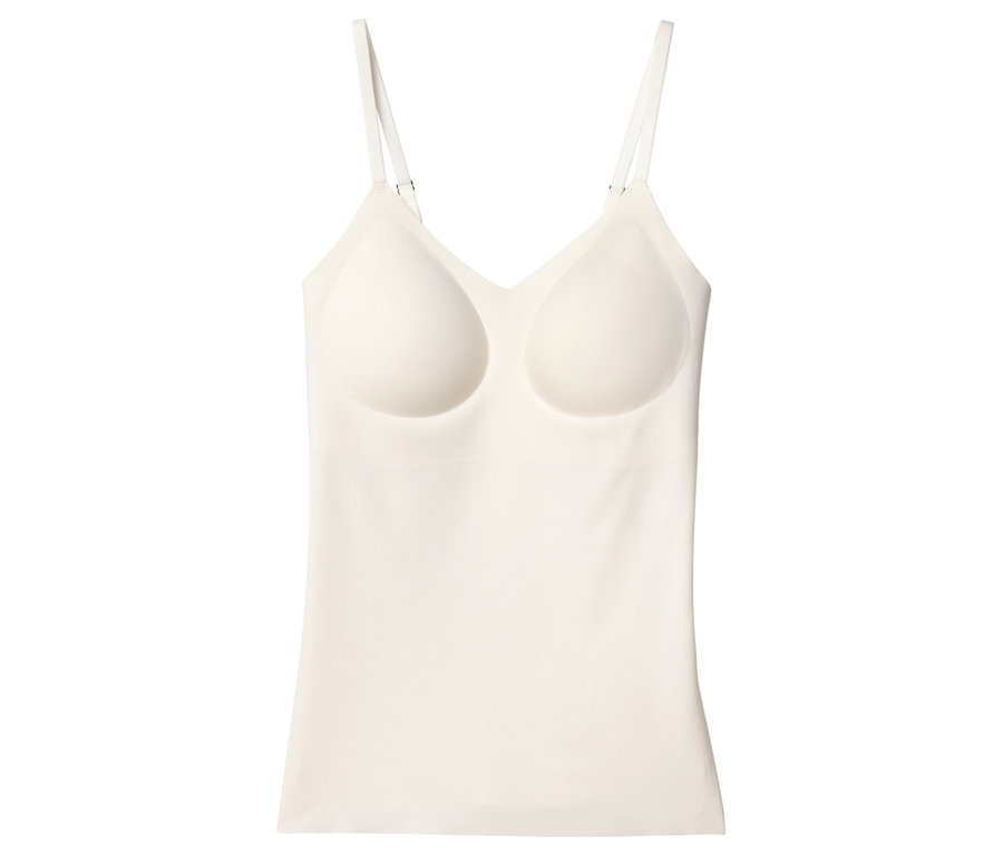 Tílko barvy slonové kosti s integrovanou podprsenkou a tenkými ramínky.