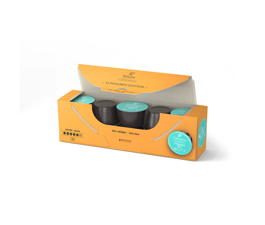 Otevřené oranžové balení Cafissimo Flavoured Espresso Toasted Nut s 10 kapslemi, kapsle jsou uvnitř viditelné.