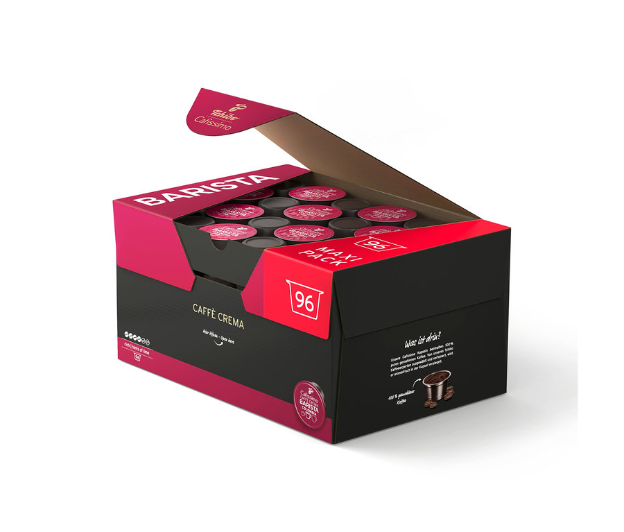 Otevřená černo-růžová krabice s 96 kávovými kapslemi Tchibo Cafissimo Caffè Crema.