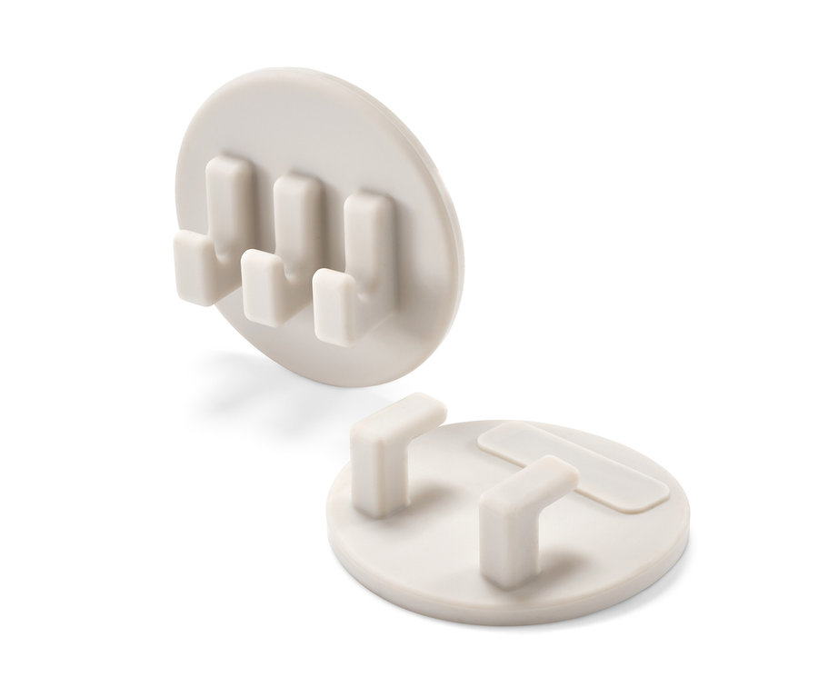 Dva samolepicí držáky.