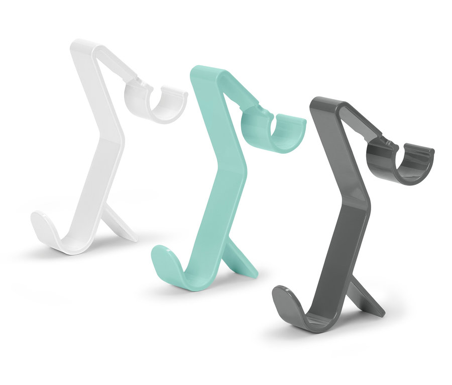 Tři držáky na telefony v bílé, tyrkysové a šedé barvě.