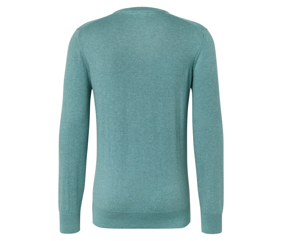 Tyrkysový svetr s dlouhými rukávy, focený zezadu.