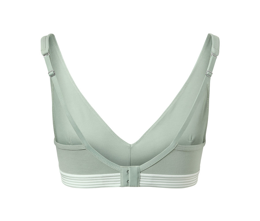 Pohled zezadu na měkkou podprsenku světle zelené barvy s bílými pruhy na spodním lemu.