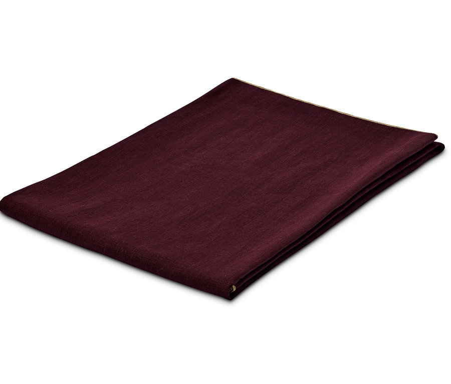 Složený lněný ubrus.