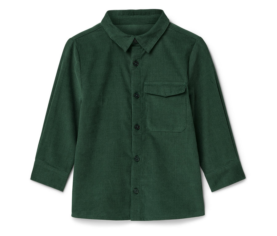 Zelená manšestrová košile leží na bílém pozadí.