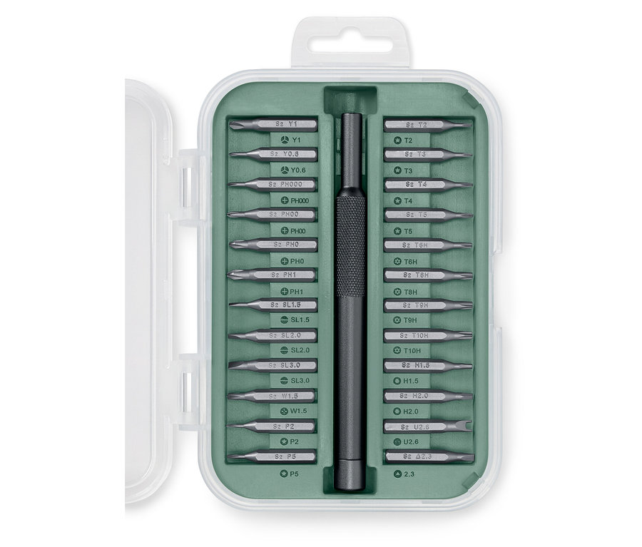 Sada precizních šroubováků v zeleném pouzdře.