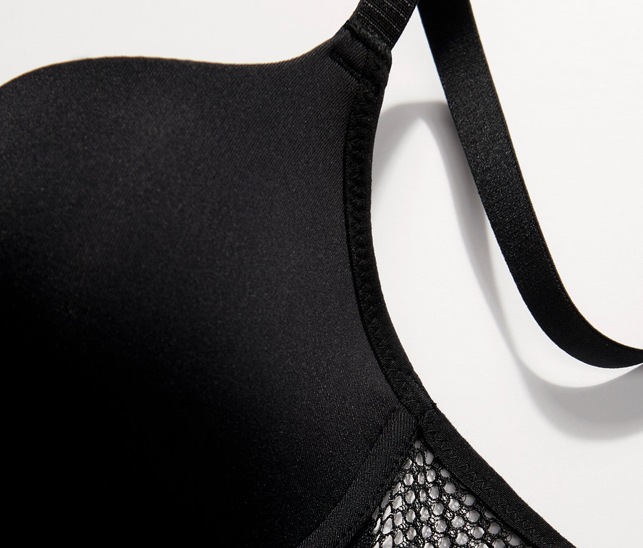 Detail of Passionata »Nina« black T-shirt bra with lace trim.