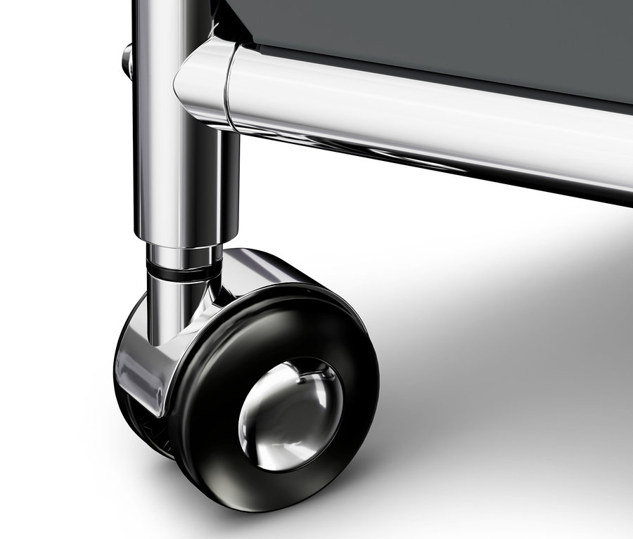 Detail šedého kovového odkládacího stolku »CN3« s kolečky.