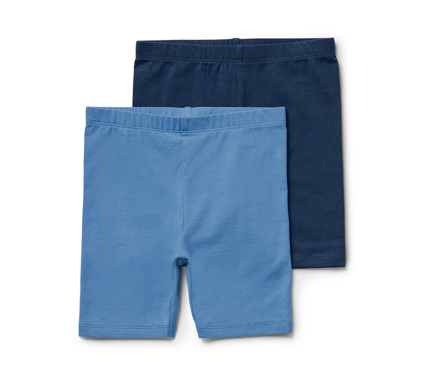 Dvoje dětské cyklistické legíny modré barvy.