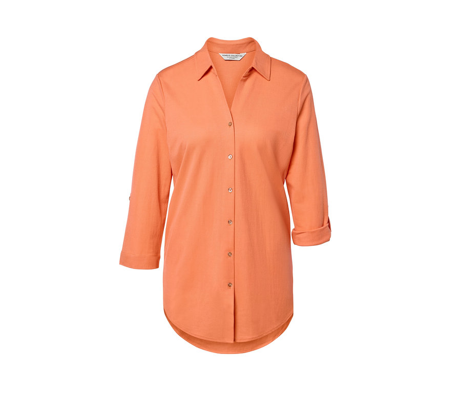 Broskvová halenka z žerzejového piké s tříčtvrtečními rukávy.