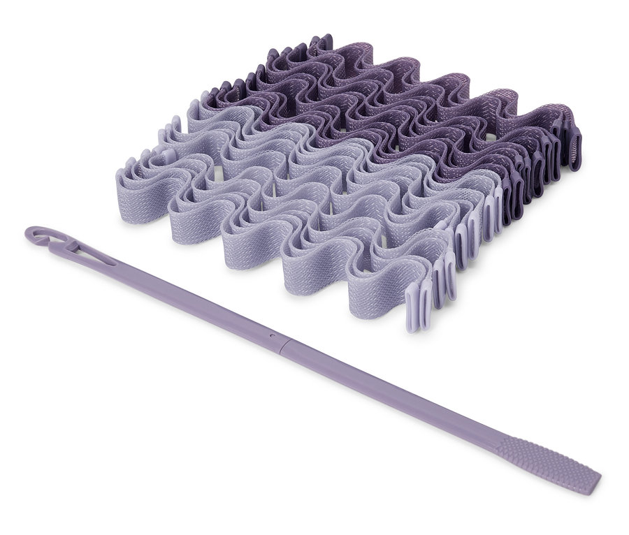 Sada fialových natáček na vlasy a aplikátor.