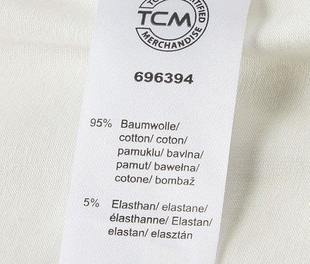 Štítek s informacemi o materiálu rostoucího body pro miminka, 5 ks. Obsahuje 95 % bavlny a 5 % elastanu.