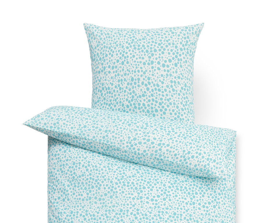 Bavlněné povlečení s modrým skvrnitým vzorem.