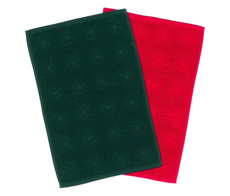 Dva ručníky: jeden zelený s hvězdičkami, druhý červený.