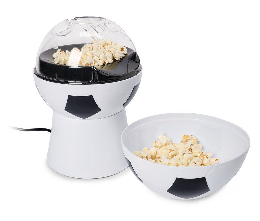 Stroj na popcorn s designem fotbalového míče s miskou popcornu.