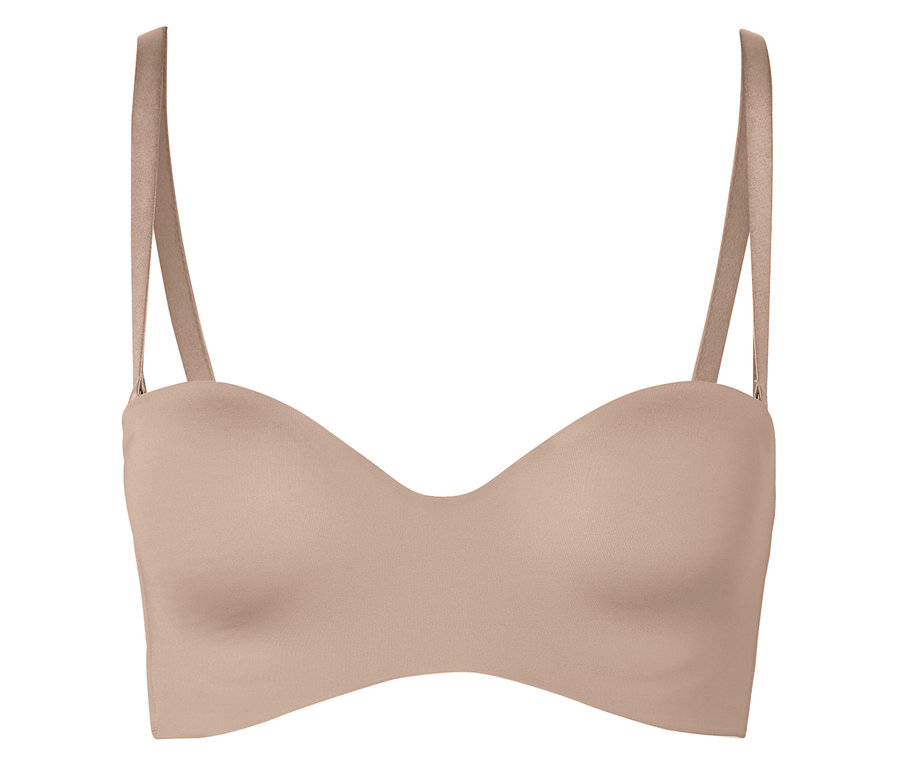 Tělová podprsenka bez ramínek s ramínky leží na bílém pozadí.