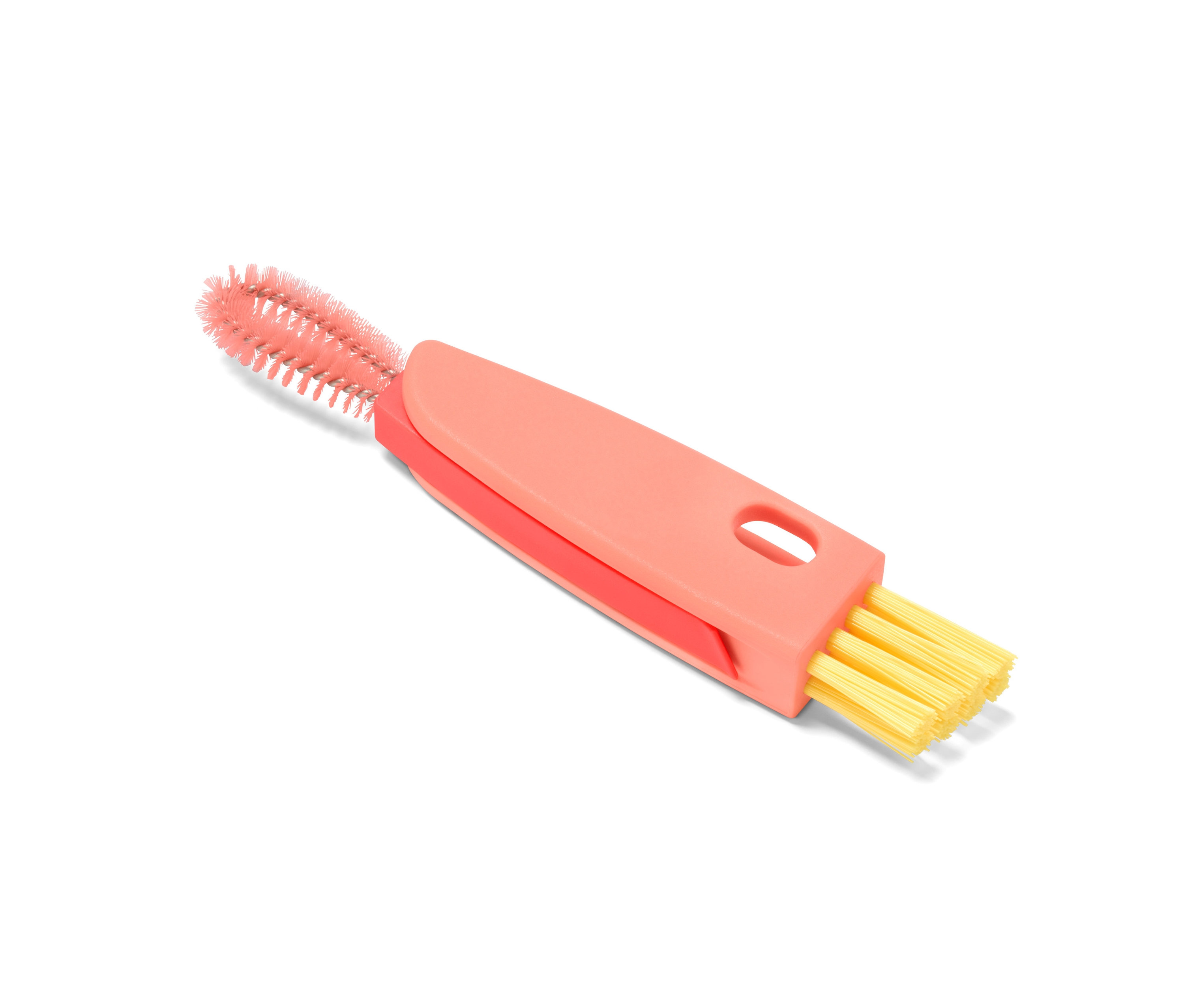 Detail multifunkčního kartáčku 3 v 1 s růžovými a žlutými štětinami.