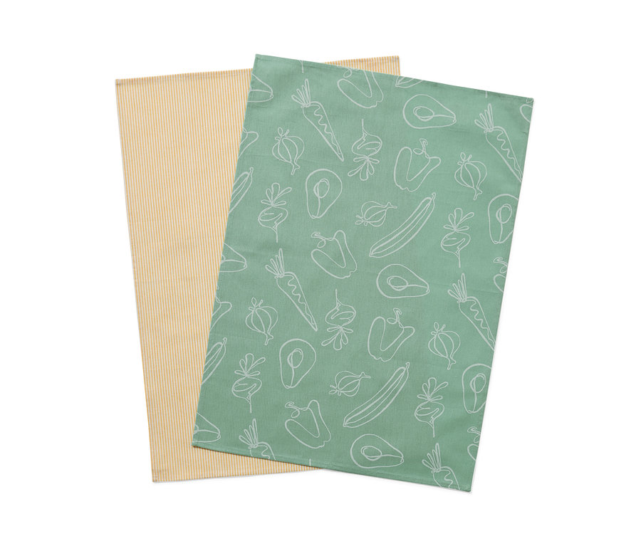 Dvě utěrky na nádobí: jedna žlutá s proužky, druhá zelená se vzorem zeleniny.