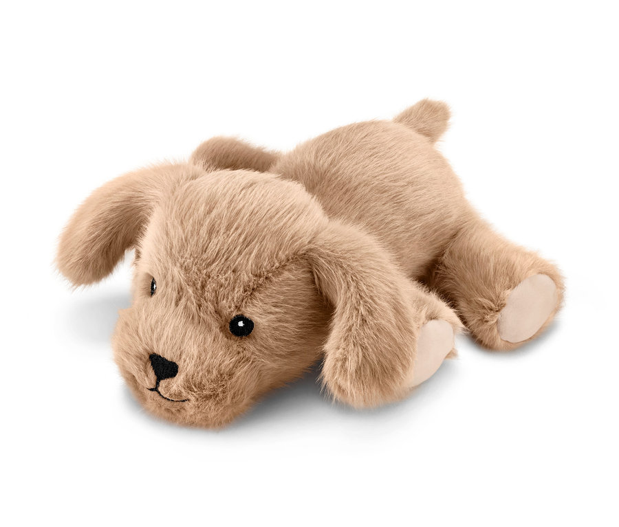 Ležící plyšový pejsek.