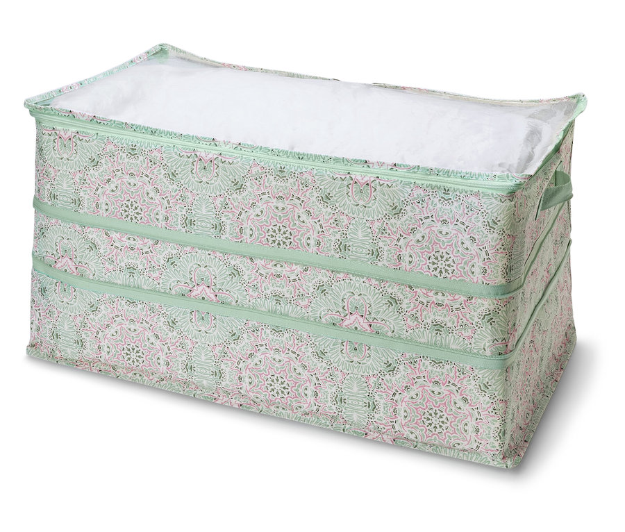 Zobrazený velký úložný box s víkem má zelený vzor s růžovými detaily.