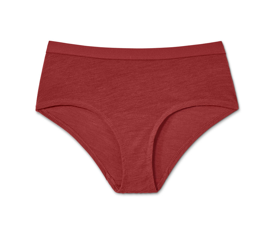 Detailní záběr červených sportovních kalhotek s vlnou merino.
