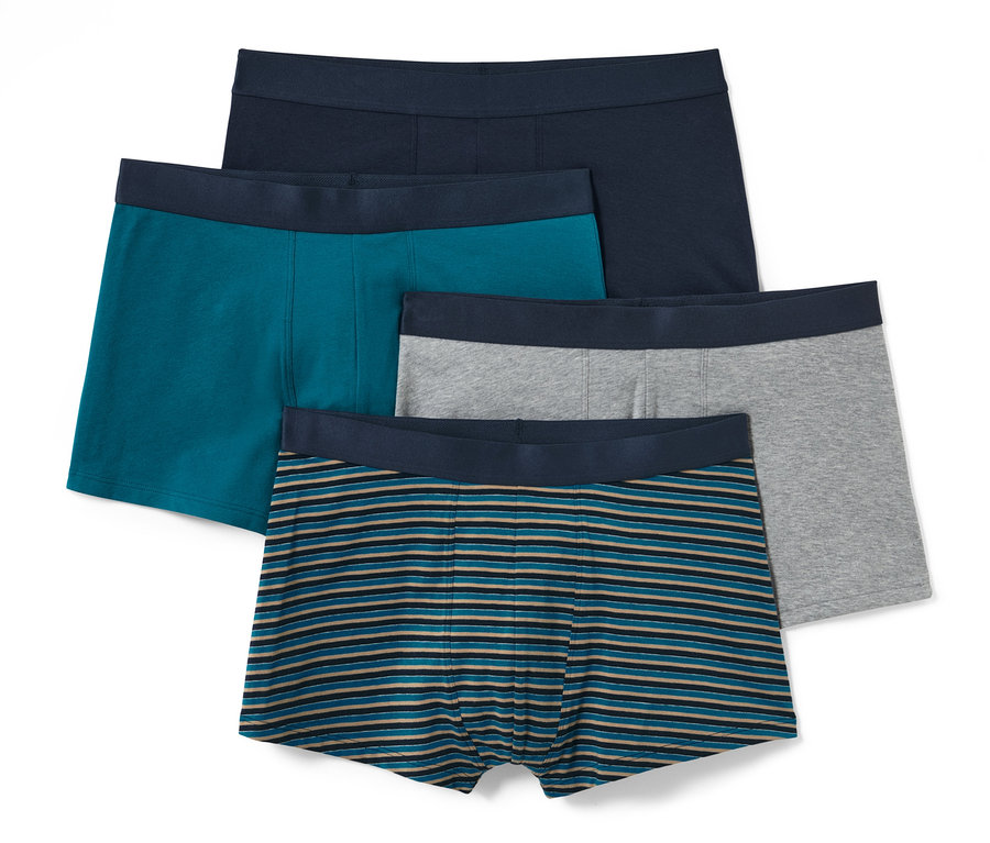 Čtyři boxerky: jedny tmavě modré, jedny tyrkysové, jedny šedé a jedny modré s hnědými proužky.