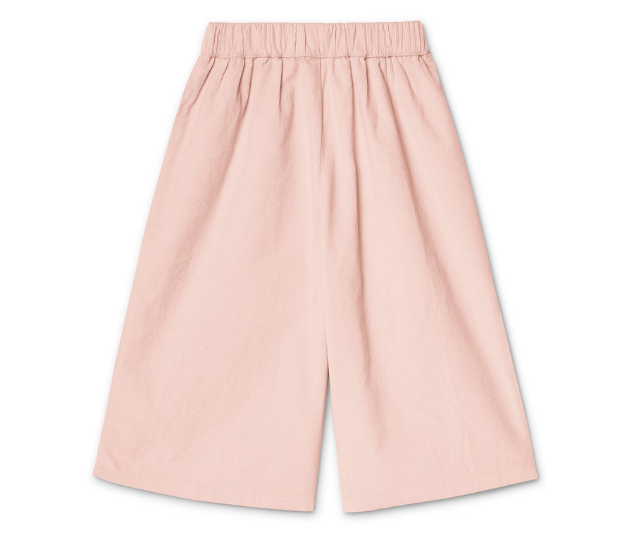 Detailní záběr na růžové culottes kalhoty s elastickým pasem.