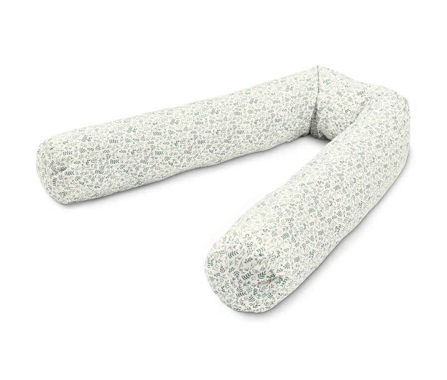 Válec do dětské postýlky s motivem listů na bílém pozadí.