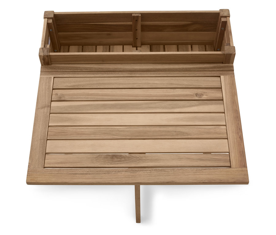 Pohled shora na obdélníkový dřevěný stůl s dřevěným úložným boxem na zadní straně, stůl má jednu podpěru.