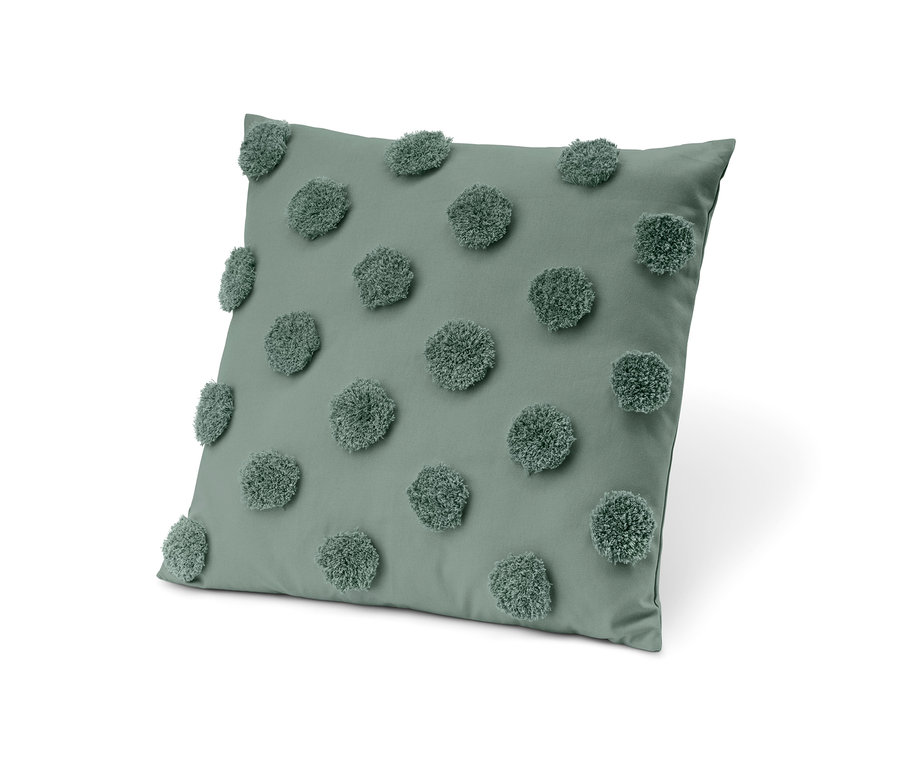 Zelený dekorační polštářek s výplní.