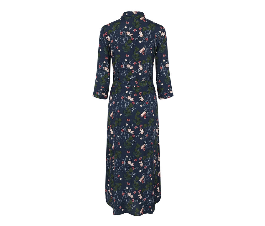 Detail šatů Halenkové s květinovým vzorem.