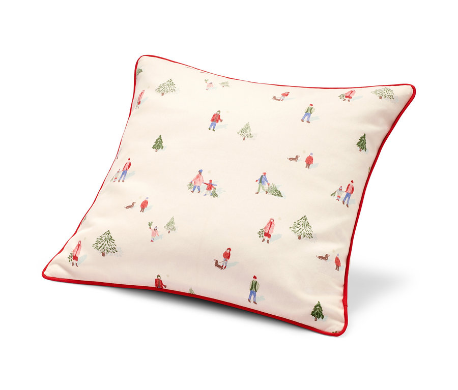 Bílý povlak na dekorační polštářek s červeným lemem a potiskem zimní krajiny.