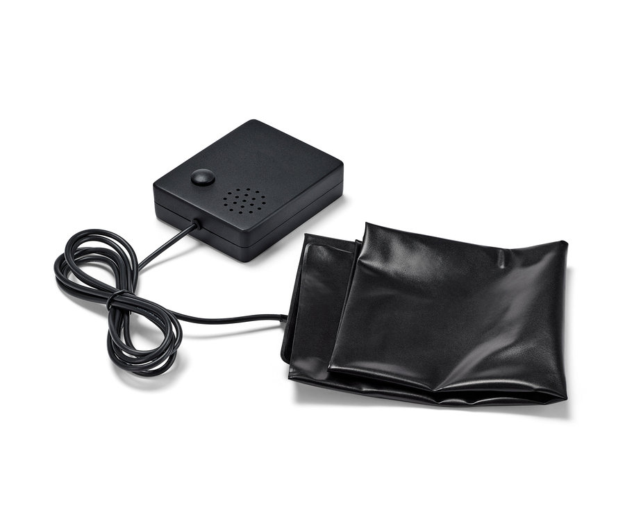 Černý senzor pod rohožku s vánoční hudbou.