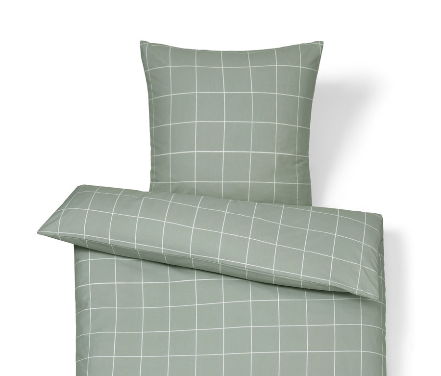 Zobrazení prémiového bavlněného povlečení standardní a nadměrné velikosti se vzorem bílé mřížky na zeleném pozadí.