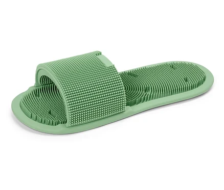 Jeden zelený masážní pantofel s výstupky.
