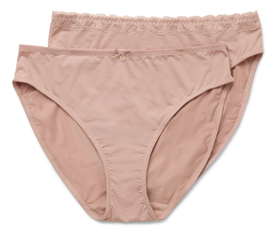 Dvoje růžových kalhotek leží na sobě.